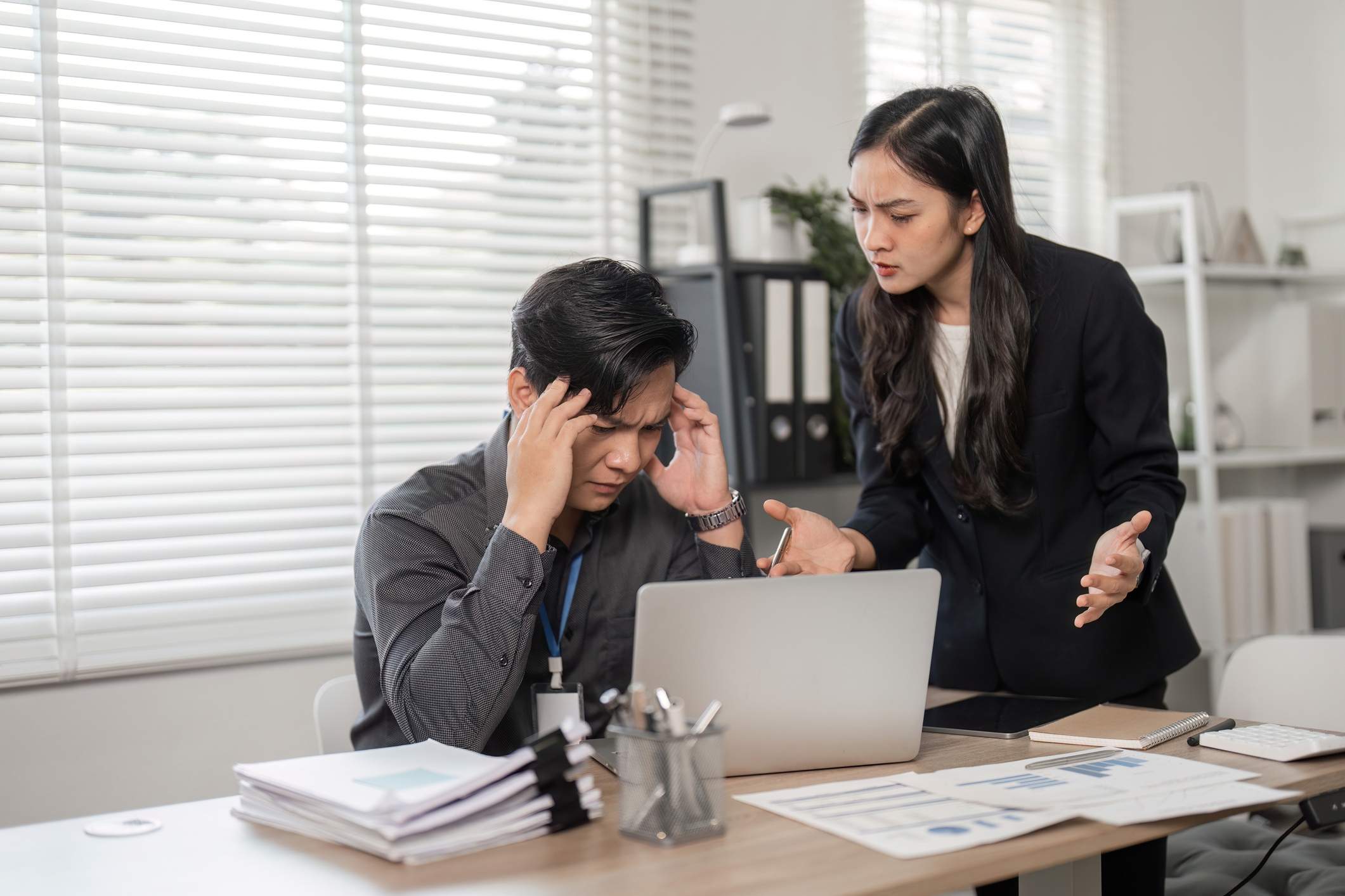 Stressed employee facing Stressed employee facing workplace conflict asks how do you prove retaliation in the workplace.